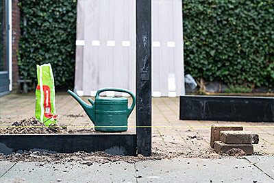 Betonpalen&#x20;schutting&#x20;plaatsen