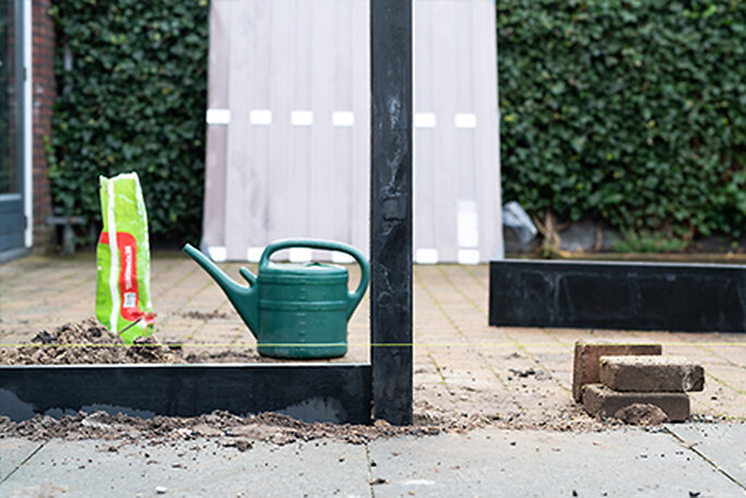 Betonpalen&#x20;schutting&#x20;plaatsen